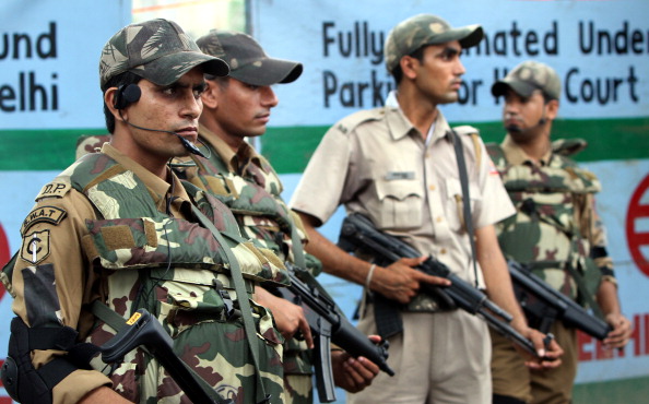 123986152-commandos-stand-guard-at-the-scene-following-gettyimages.jpeg