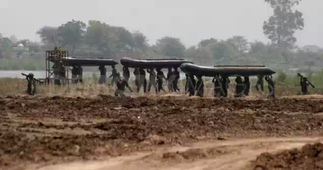 1306752412-indian-soldiers-undertake-military-war-exercises_709201.jpeg