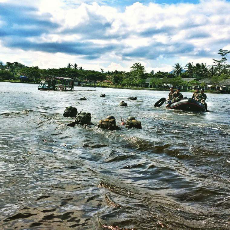 330th Airborne Batt perform military tactical swimming exercise.jpg