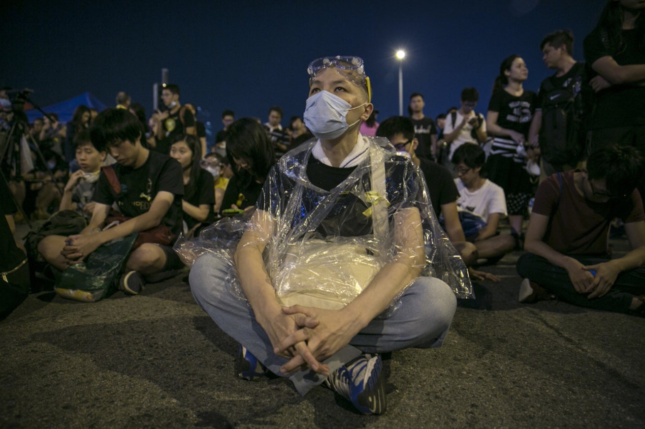 A government spokesman urged student leaders to clear a footbridge.jpg