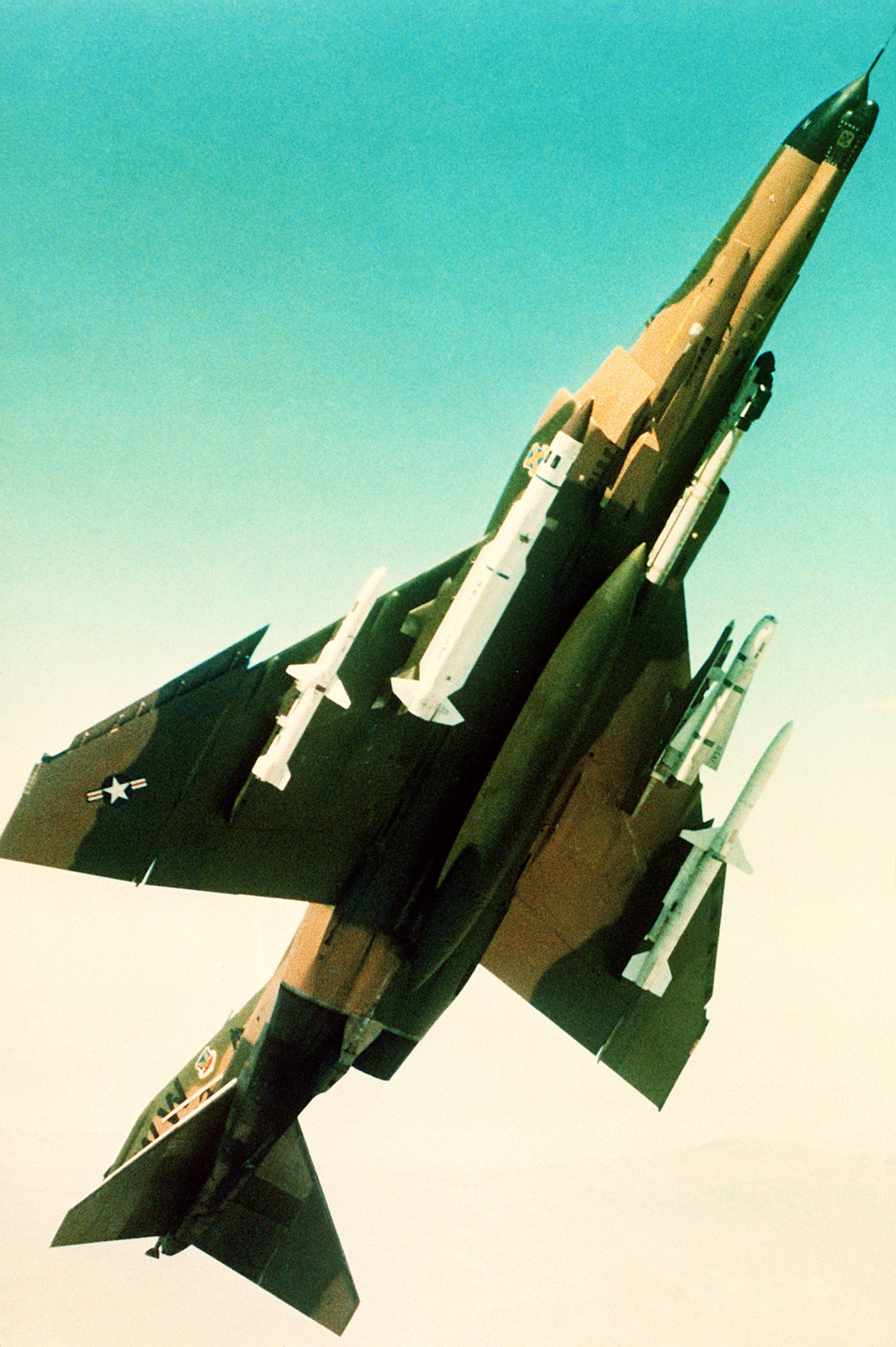 an-air-to-air-view-of-the-underside-of-an-f-4g-phantom-ii-aircraft-carrying-52d84b-1600.jpg