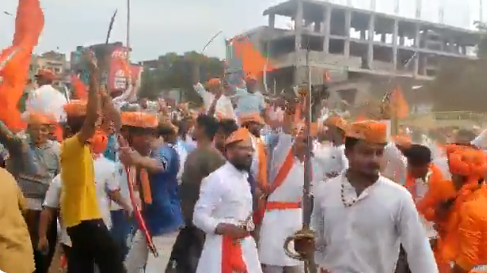 Bajrang-Dal-workers-dance-on-Belagavi-road.-Part-of-Dasara-celebrations..png