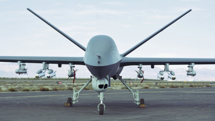 CH-5 armed reconnaissance UAV pictured with guided weapons during a 21 Sep test in NW China.jpg