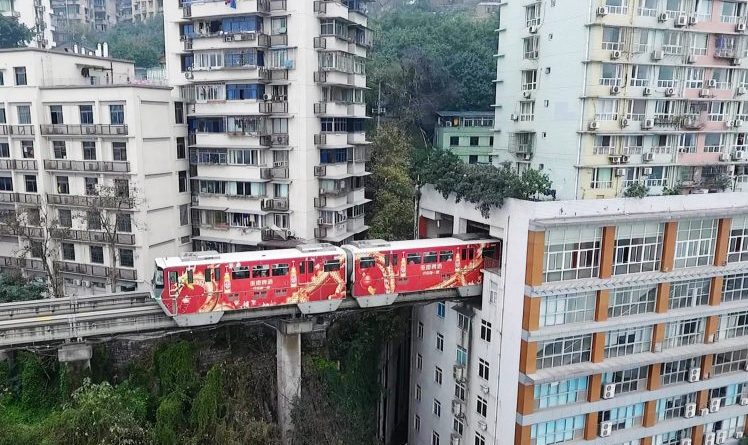 China-has-a-train-track-passing-through-19-storey-block-of-flats.jpg