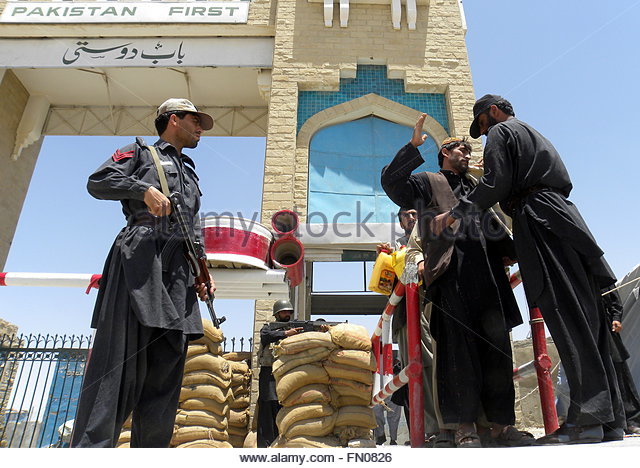 epa02211040-pakistani-paramilitary-soldiers-stand-guard-as-people-fn0826.jpg