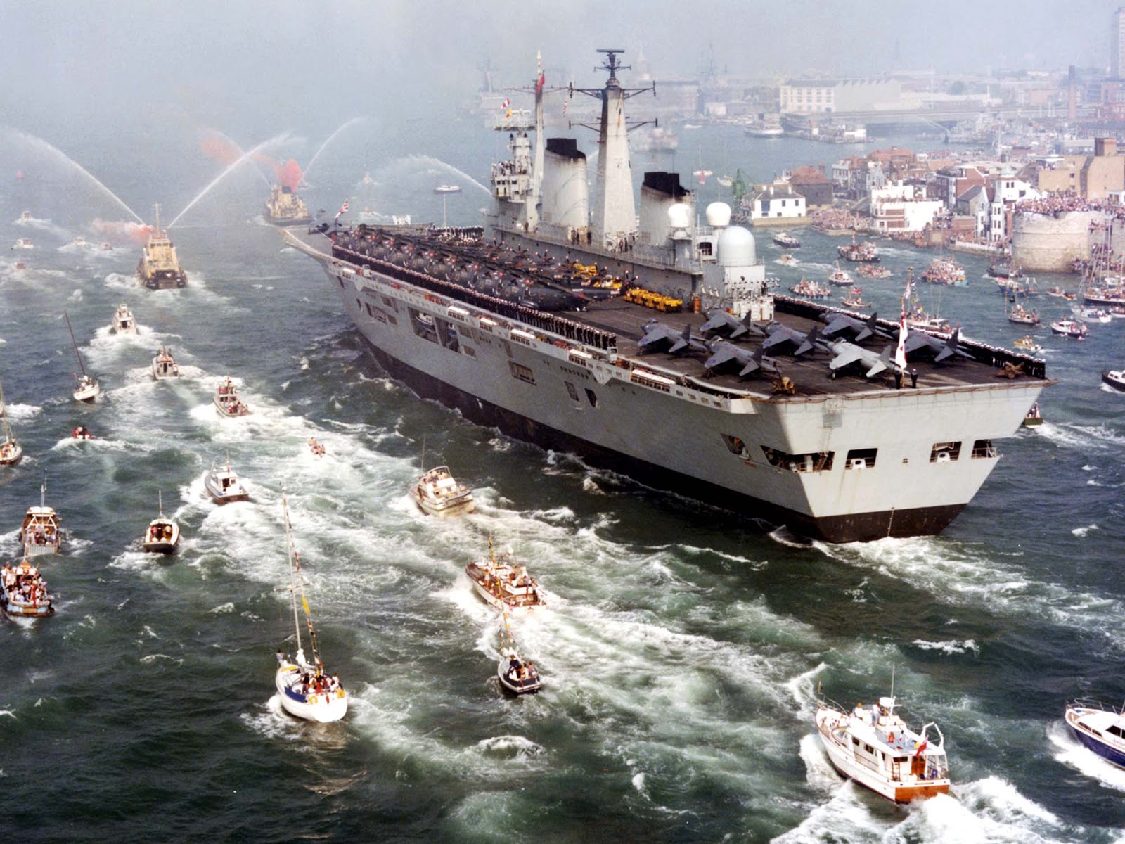 HMS Invincible returns home following the Falklands Conflict, 1982.jpg