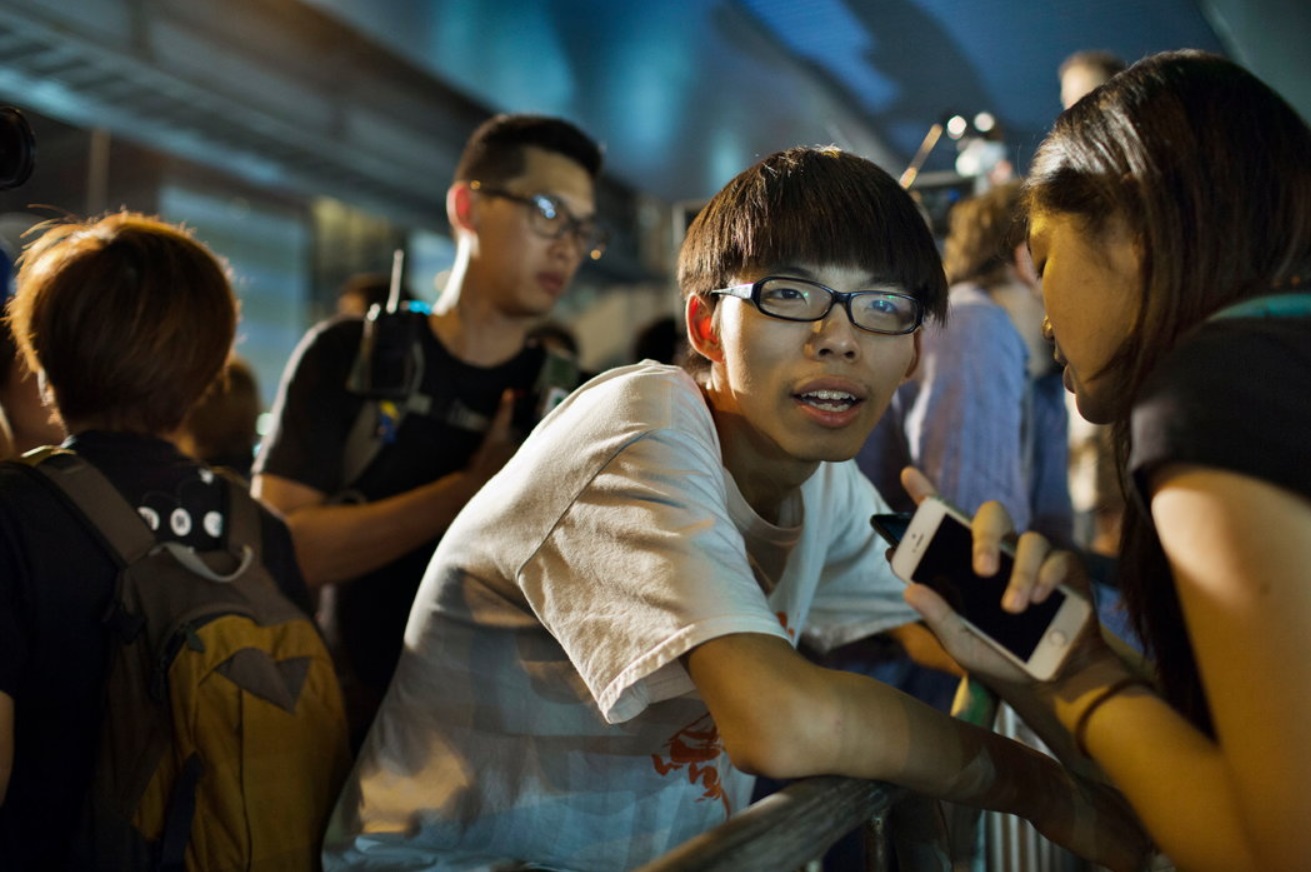 Joshua Wong, a 17-year-old student activist, preparing to speak  at a protest Saturday.jpg