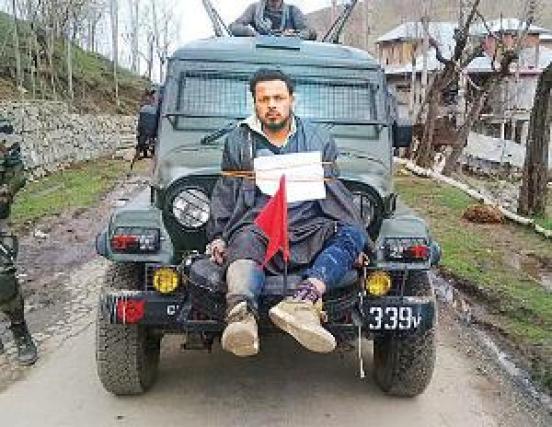 kashmiri-tied-to-jeep.jpg