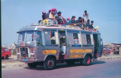 KVS404-People-travelling-on-mini-bus-Karachi.11.jpg