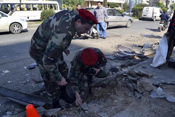 Lebanese army soldiers inspect a site of a roadside.jpg