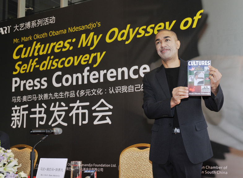 Mark-Obama-Ndesandjo-with-his-new-memoir.jpg