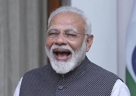 modi laugh joker.jpeg