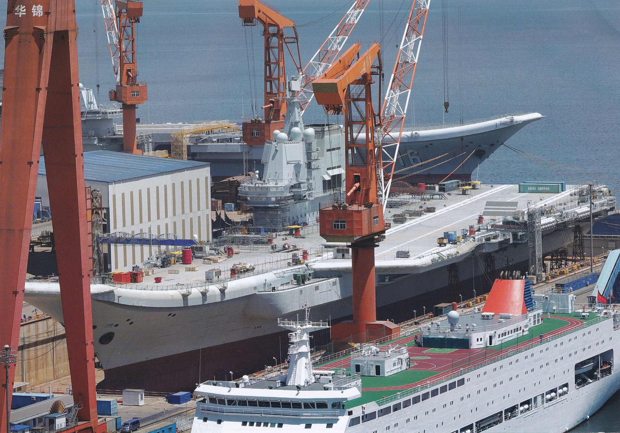 PLN Type 003 carrier at Dalian behind.jpg