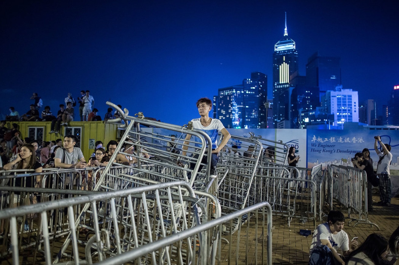 Protesters used barricades to block a road outside the government complex..jpg