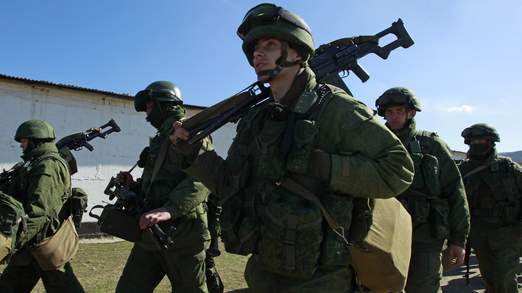 Russian soldiers surround Ukrainian military units in Perevalnoye, Crimea.jpg