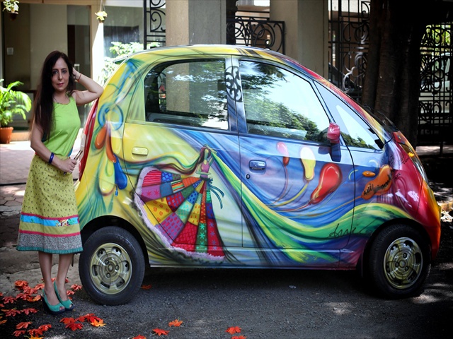 Sangeeta with Car640x480.jpg