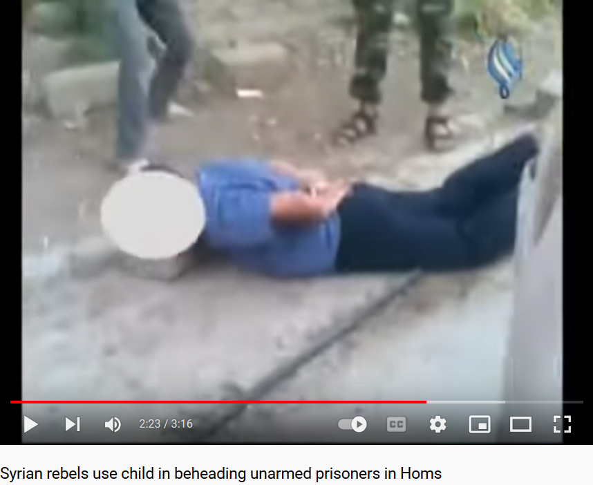 Screenshot_2022-05-01 Syrian rebels use child in beheading unarmed prisoners in Homs.png