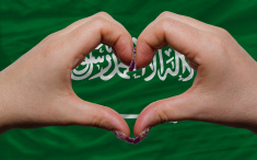 stock-photo-31367896-over-flag-of-saudi-arabia-showed-heart-and-love-gesture.jpg