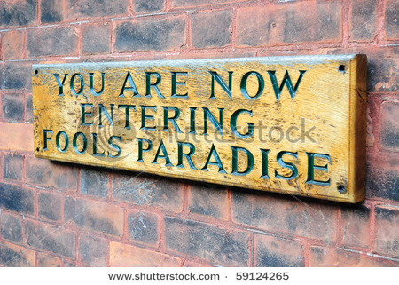 stock-photo-you-are-now-entering-fools-paradise-59124265.jpg