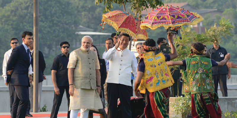 Xi-Jinping-holds-a-traditional-Gujarati.jpg