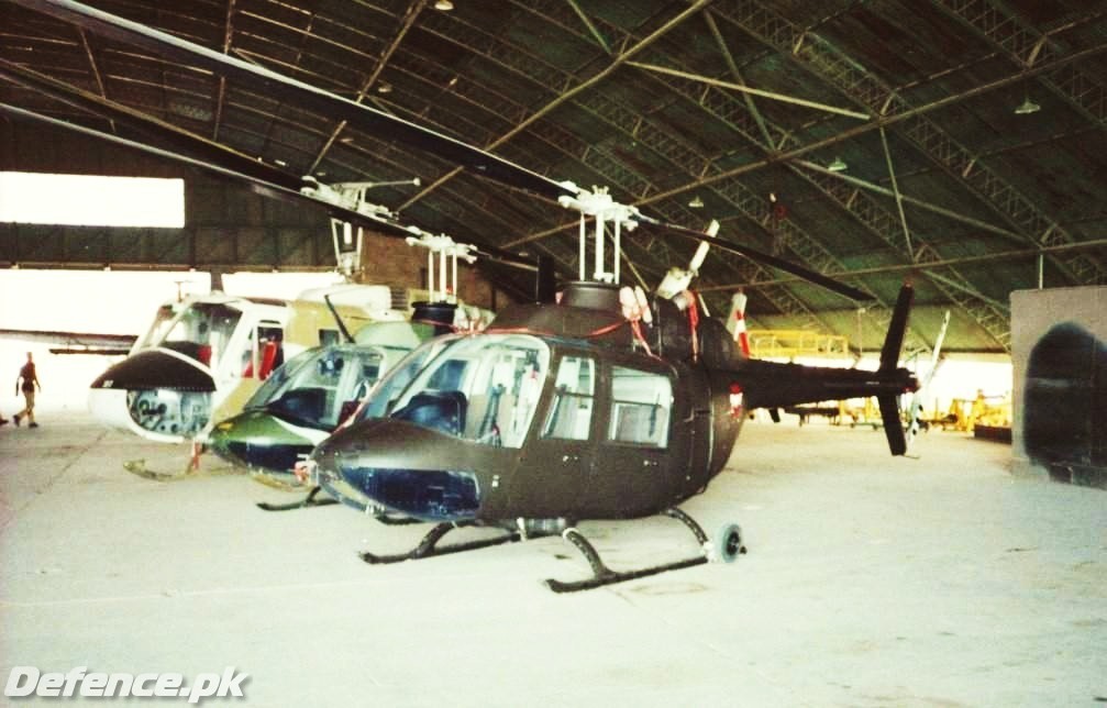 Two Jet-rangers and UH-1H