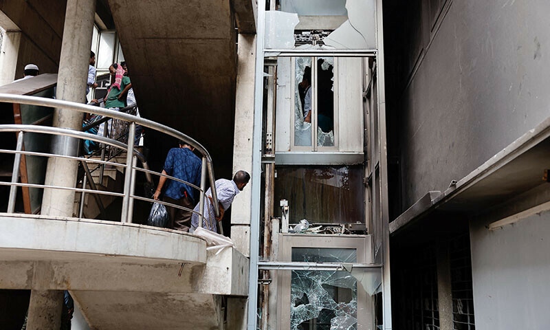 People visit the Bangabandhu Sheikh Mujibur Rahman Memorial Museum, which was vandalised after the resignation of Bangladeshi Prime Minister Sheikh Hasina, in Dhaka, Bangladesh, August 6, 2024. — Reuters