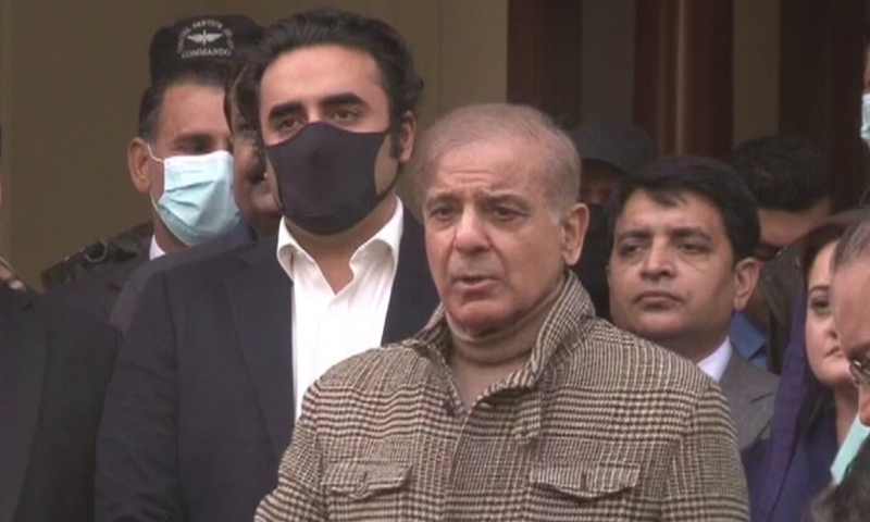 PML-N President Shehbaz Sharif (R) and PPP Chairman Bilawal Bhutto-Zardari (L) speak to the media outside the former's residence in Lahore. — DawnNewsTV