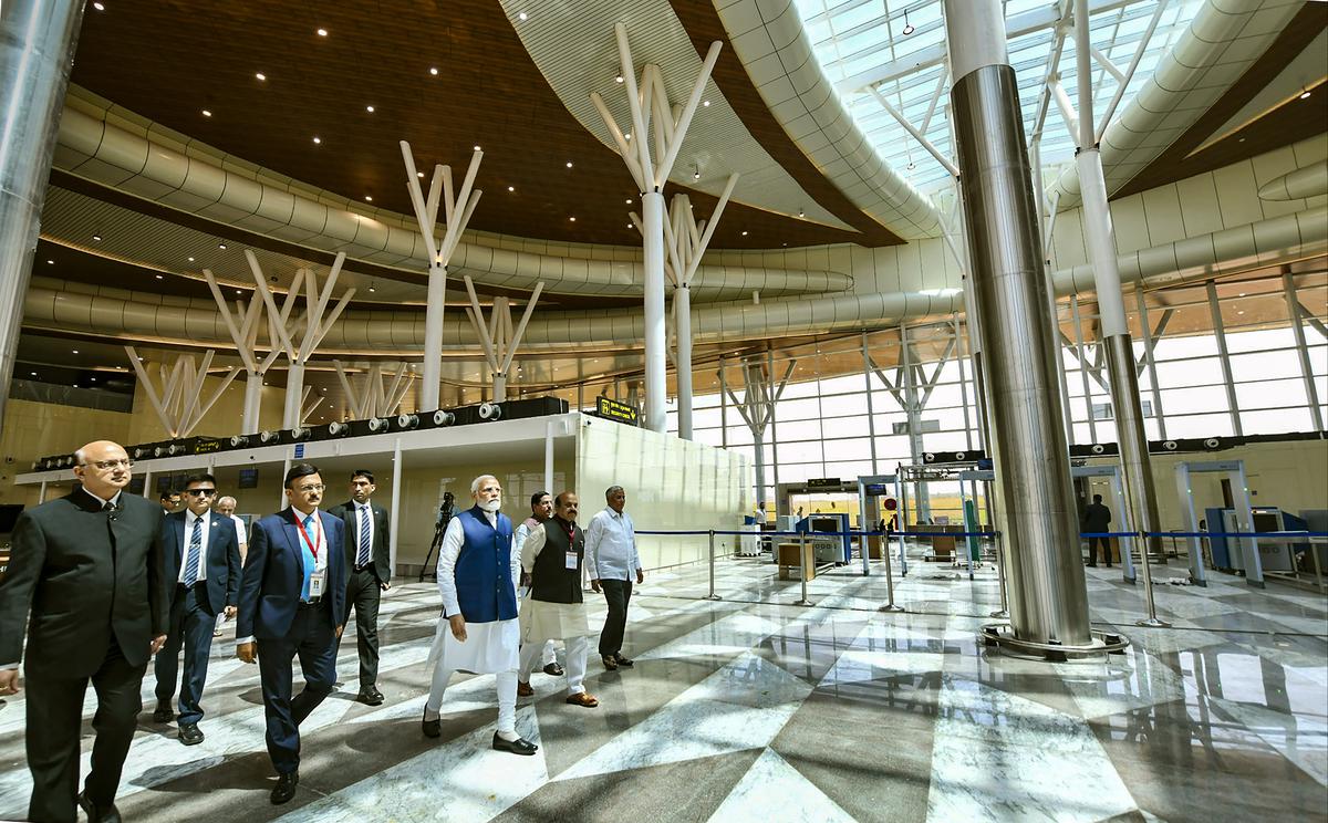 Prime Minister Narendra Modi takes a look at the new airport in Shivamogga on February 27, 2023. 