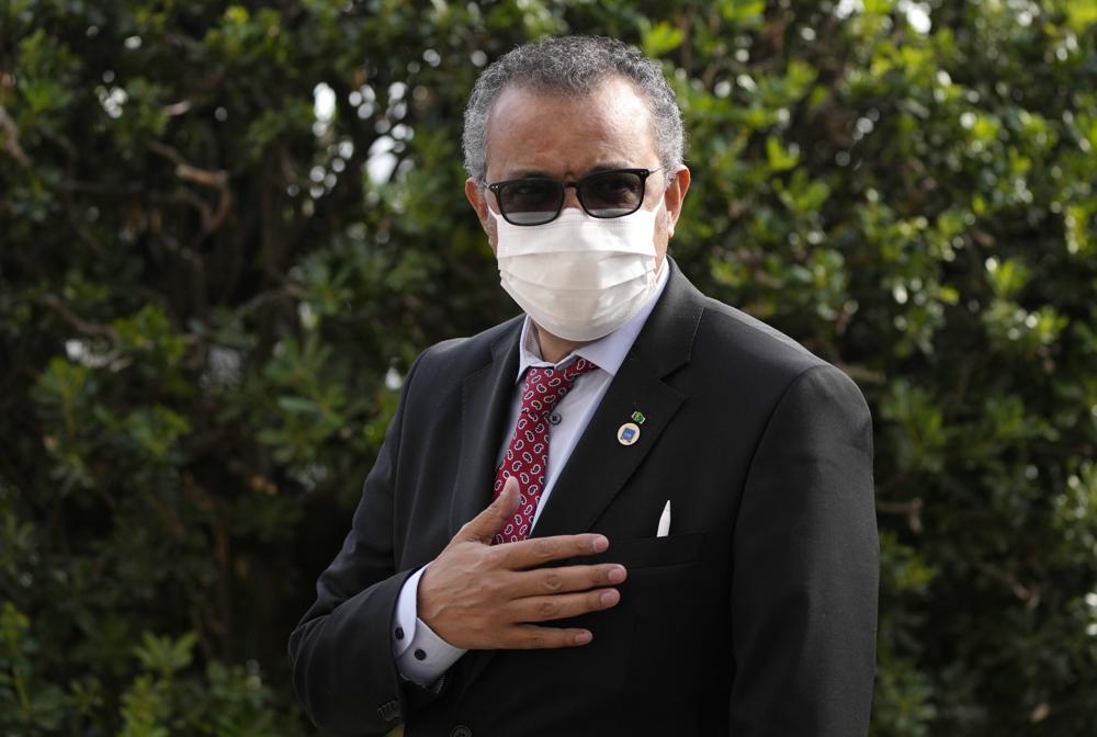 FILE - World Health Organisation Tedros Adhanom Ghebreyesus waves as he arrives for a meeting of G20 finance and health ministers at the Salone delle Fontane (Hall of Fountains) in Rome, Oct. 29, 2021. The World Health Organization on Wednesday, Dec. 29 the number of COVID-19 cases recorded worldwide increased by 11% last week compared with the previous week, with the biggest increase in the Americas. The gain followed a gradual increase since October. (AP Photo/Alessandra Tarantino, file)