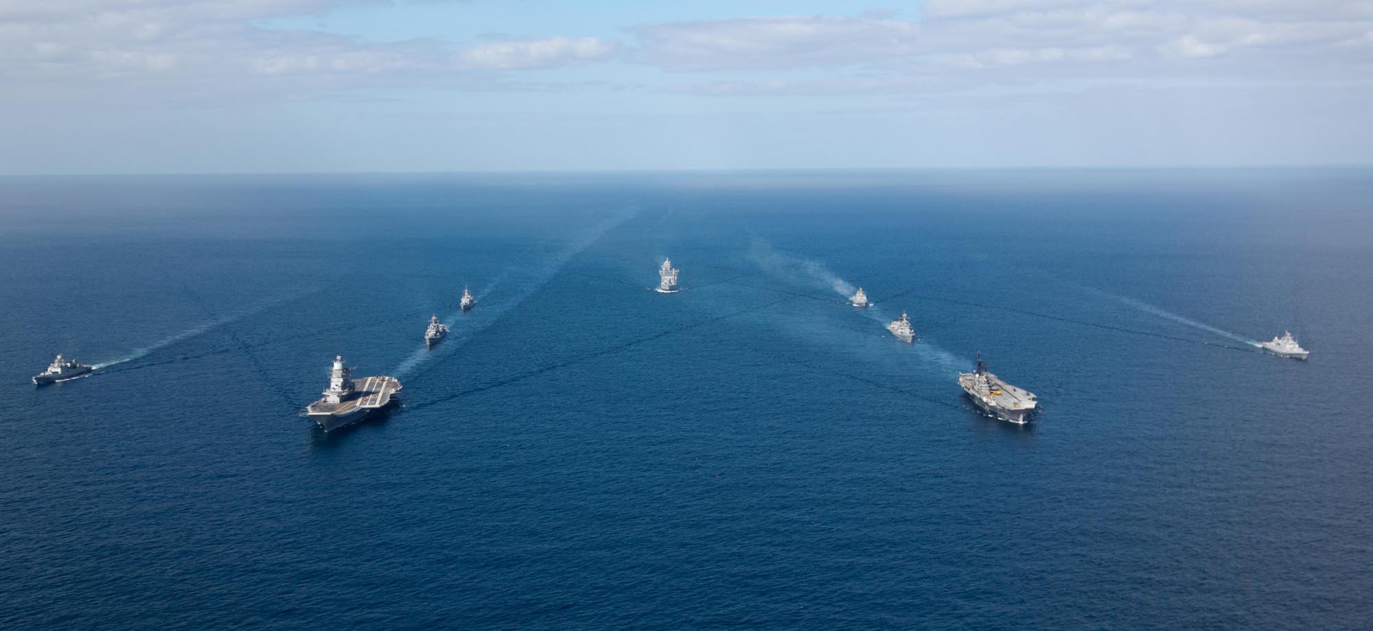 Indian_Navy_flotilla_escorting_aircraft_carrier_Vikramaditya_(R33).jpg