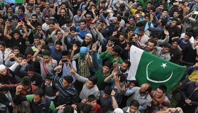 kashmiri protestors wave pakistan s flag at a protest photo afp file