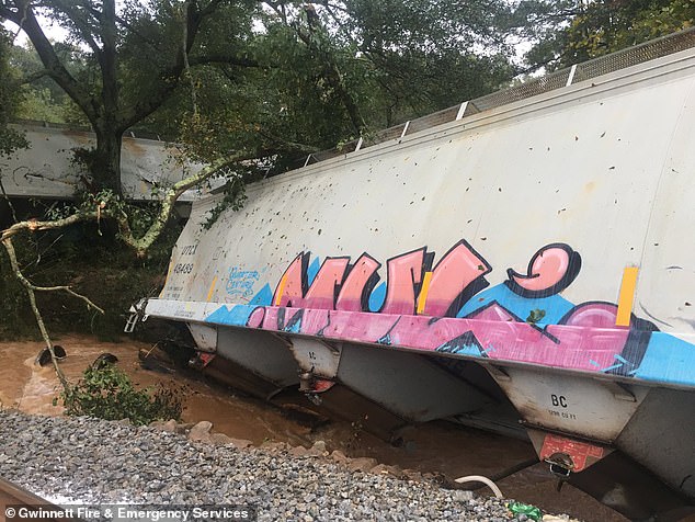 A portion of the train is seen on Sunday morning following the accident