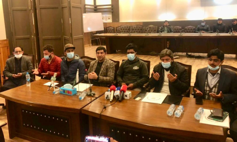 Families and friends of the three climbers are seen at the press conference in Skardu on Thursday. — Photo courtesy: Alpine Club of Pakistan