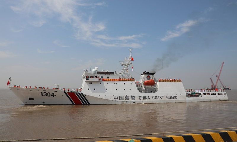 A China Coast Guard ship on a fisheries law enforcement mission in the North Pacific Ocean sets sail from Shanghai, east China, on July 30, 2021.(Photo: Xinhua)