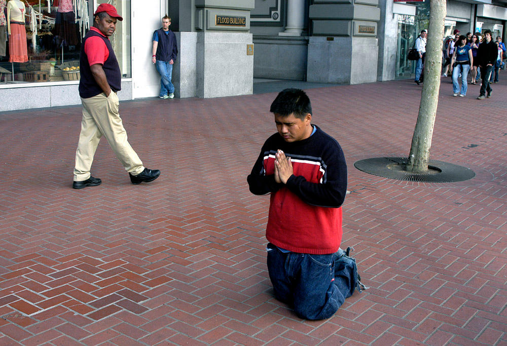 Praying_on_Market_Street_by_photoart1.jpg