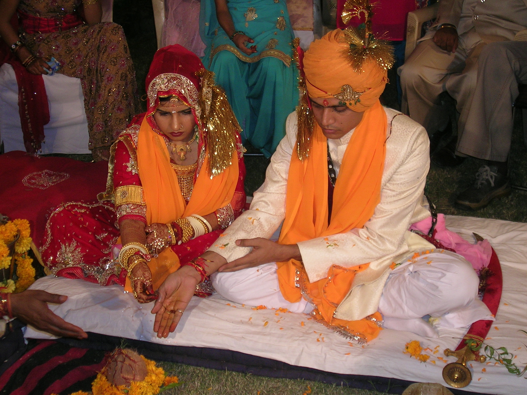 Hindu_marriage_ceremony_offering.jpg