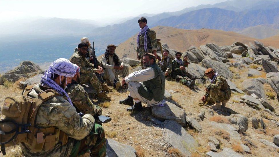 Anti-Taliban forces on patrol on a hilltop in Panjshir area