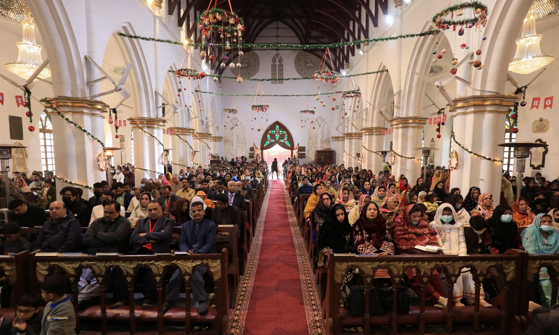 People attend a Christmas Day service at the St John's Cathedral in Peshawar on December 25, 2021. — Reuters