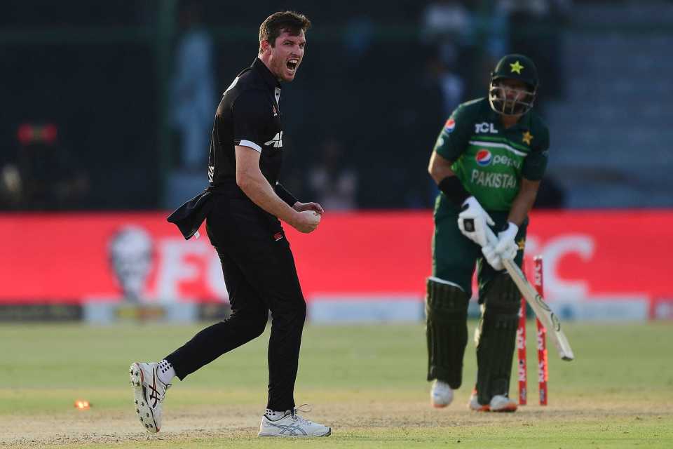 Adam Milne celebrates the wicket of Imam-ul-Haq