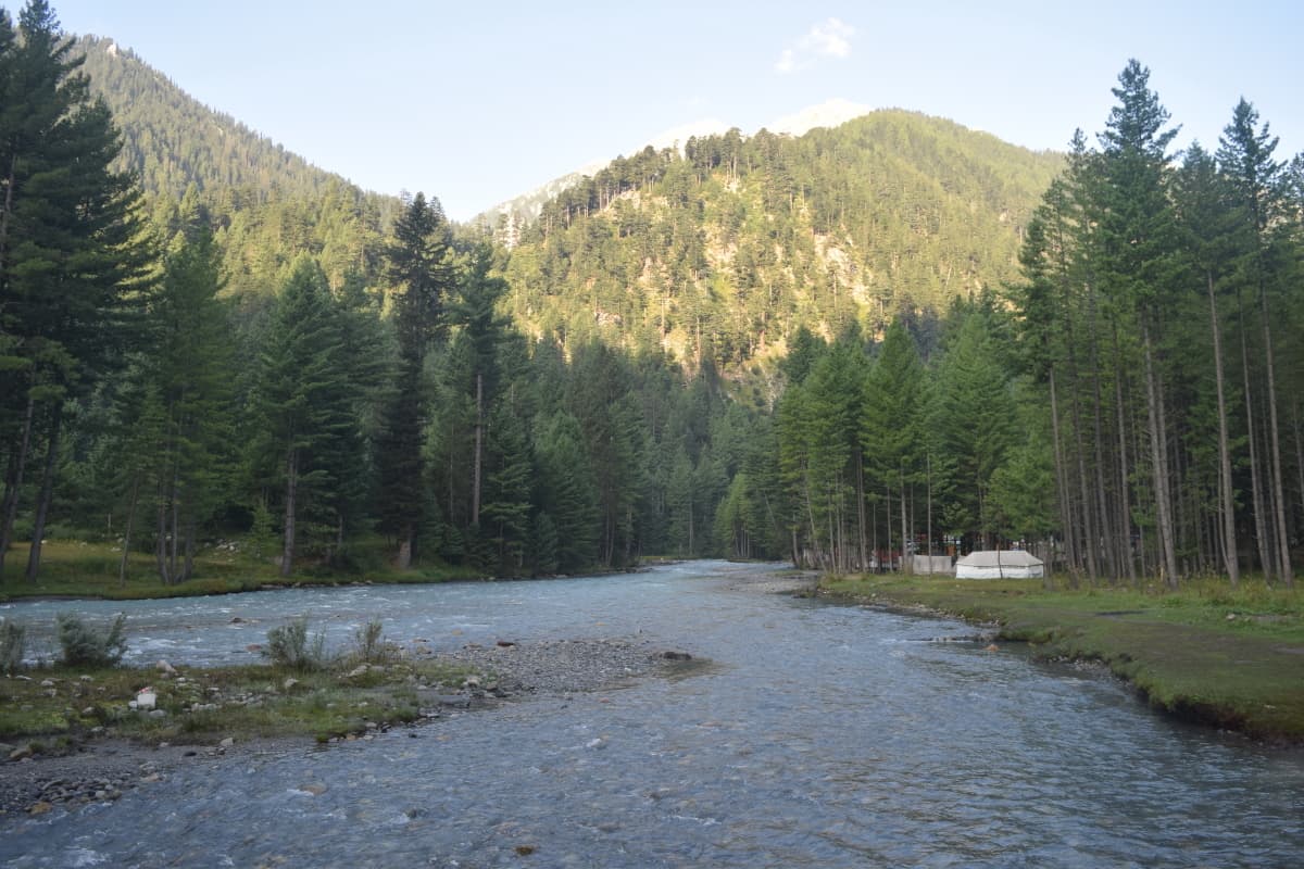 The blue waters of Panjkora river near Kumrat forest rest house.