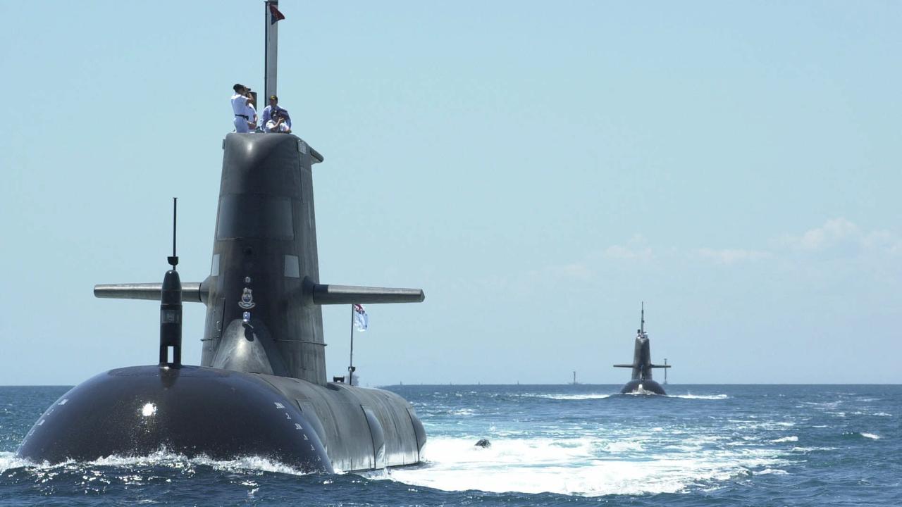 Collins class submarines Sheean and Dechaineux arriving at HMAS Stirling naval base, in Western Australia.