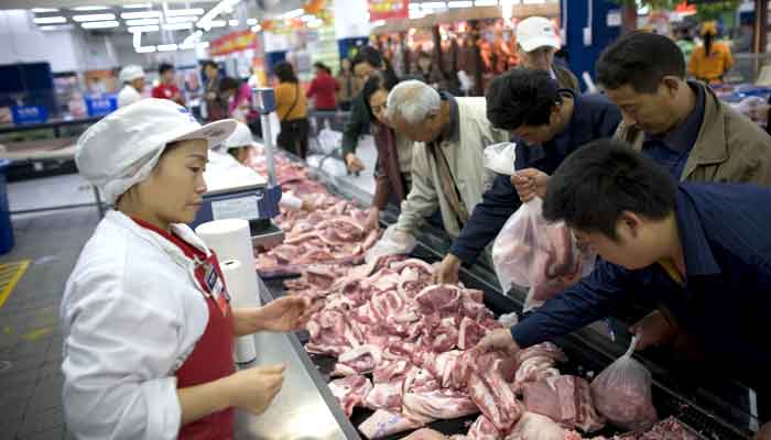 478010_7305599_Chinese-meat-market_akhbar.jpg