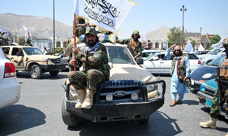 Taliban security personnel ride in a convoy to celebrate the third anniversary of the Taliban takeover of Afghanistan in Kabul on August 14. — AFP