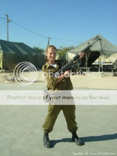 IsraeliArmyGirlshowinghergun.jpg