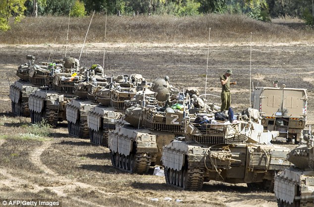 1407153071325_wps_3_Israeli_Merkava_tanks_tak.jpg