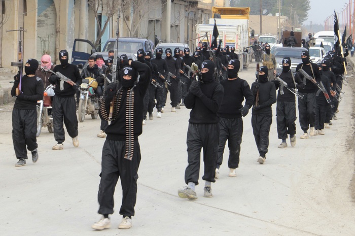 isil-fighters-parade-streets-syrian-town-tel-abyad.jpg