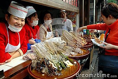 chengdu-china-food-vendors-jin-li-street-14686160.jpg