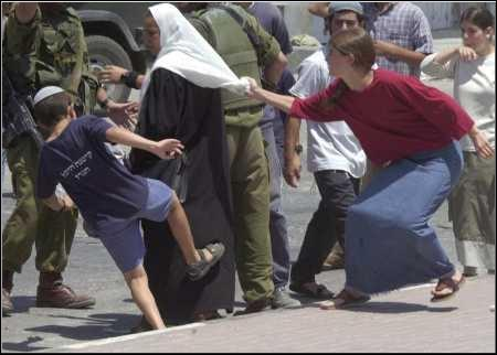 Palestinian-woman-being-attacked-by-Jewish-settlers1.png