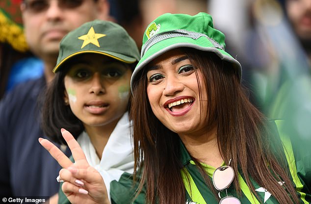 Pakistan will either face England in the final (pictured: Fans watch the ICC Men's T20 World Cup match between India and Pakistan on October 23)