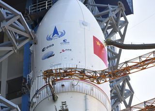 The Long March-5 rocket for China's Tianwen-1 Mars mission was transported to the launch area at China’s Wenchang Space Launch Center on July 17, 2020. Note the logos of the European (ESA), French (CNES), Argentine (CONAE) and Austrian (FFG) space agencies in addition to that of the China National Space Agency (CNSA).